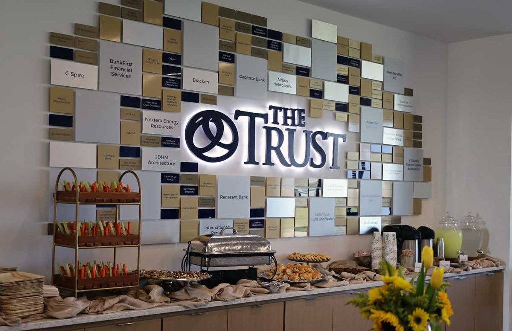 The Trust Wall at the GTR Link Office showcasing members